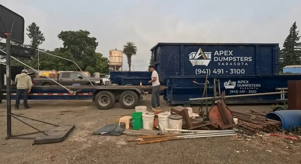 Blue roll-off dumpsters ready for delivery